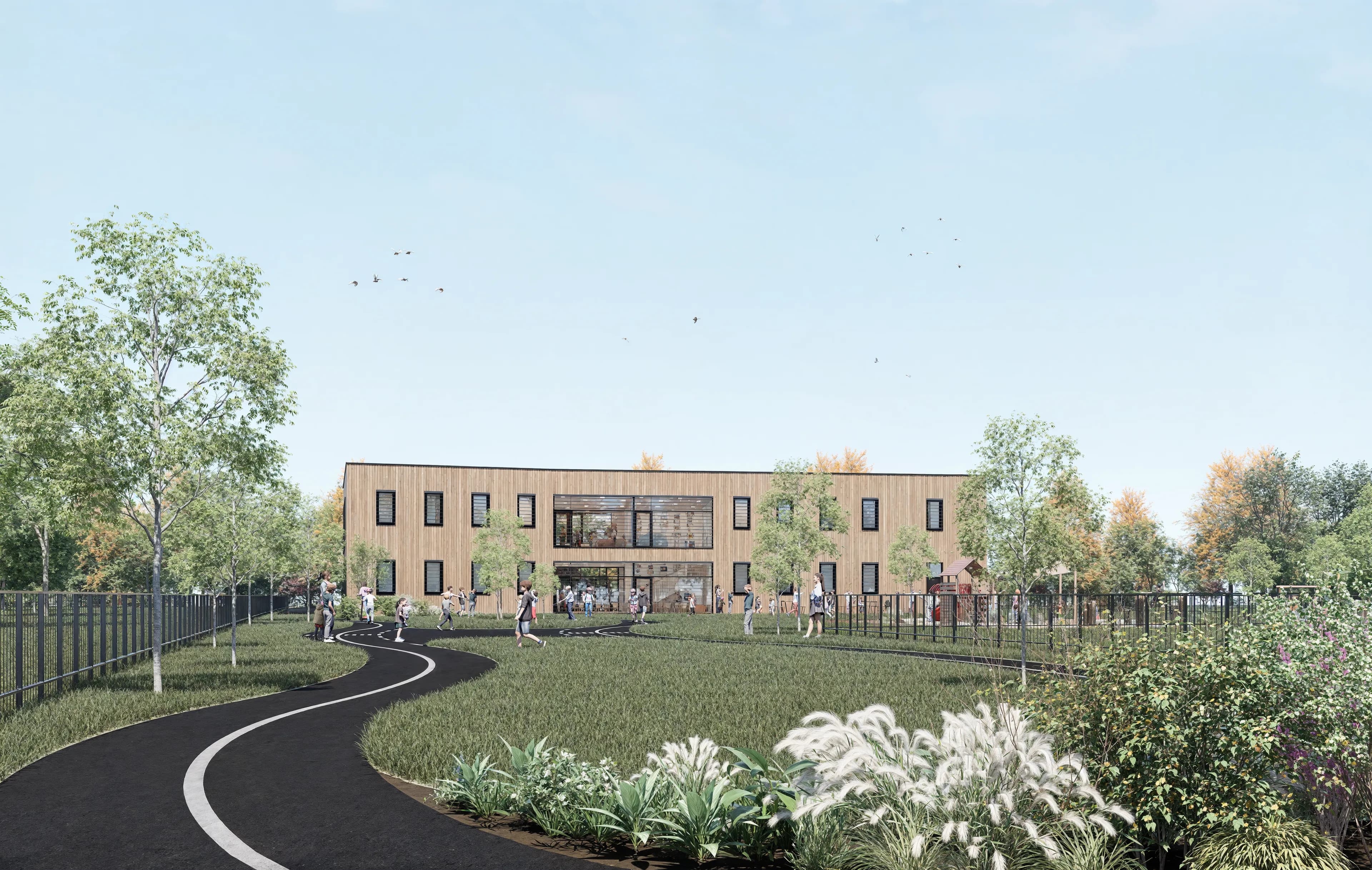 Kombinace zelených a zpevnených ploch tvořící podnětné prostředí pro děti